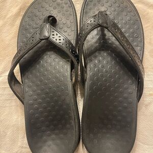 Black Vionic flip flops